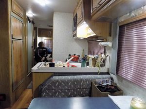 Kitchen area of 1993 Class C RV. Notice the pink blinds! They were the first to go. 